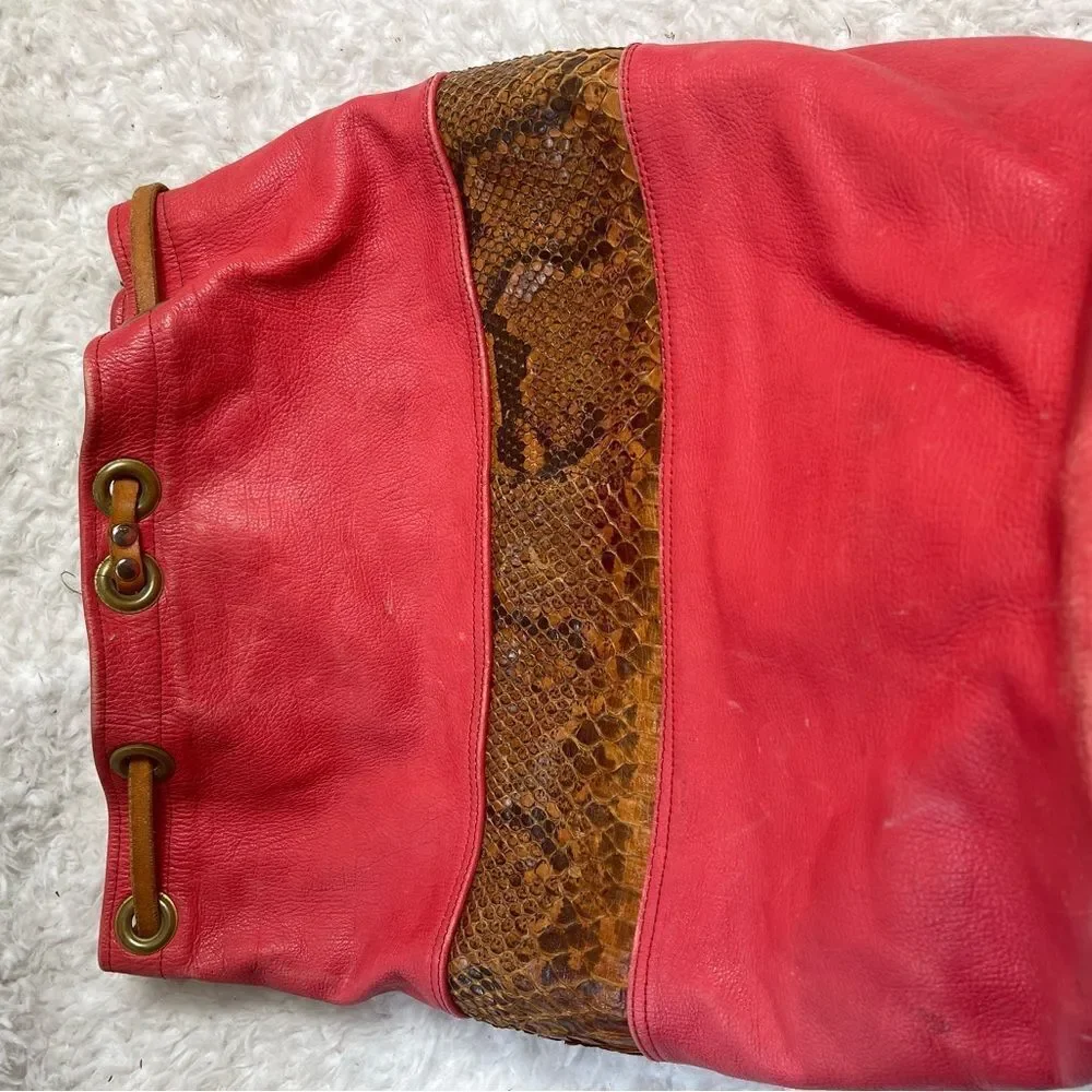 Leather orange and Brown snake skin print  Xlarge bucket bag sling back tan trap